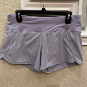 Lululemon mid rise 4”shorts.